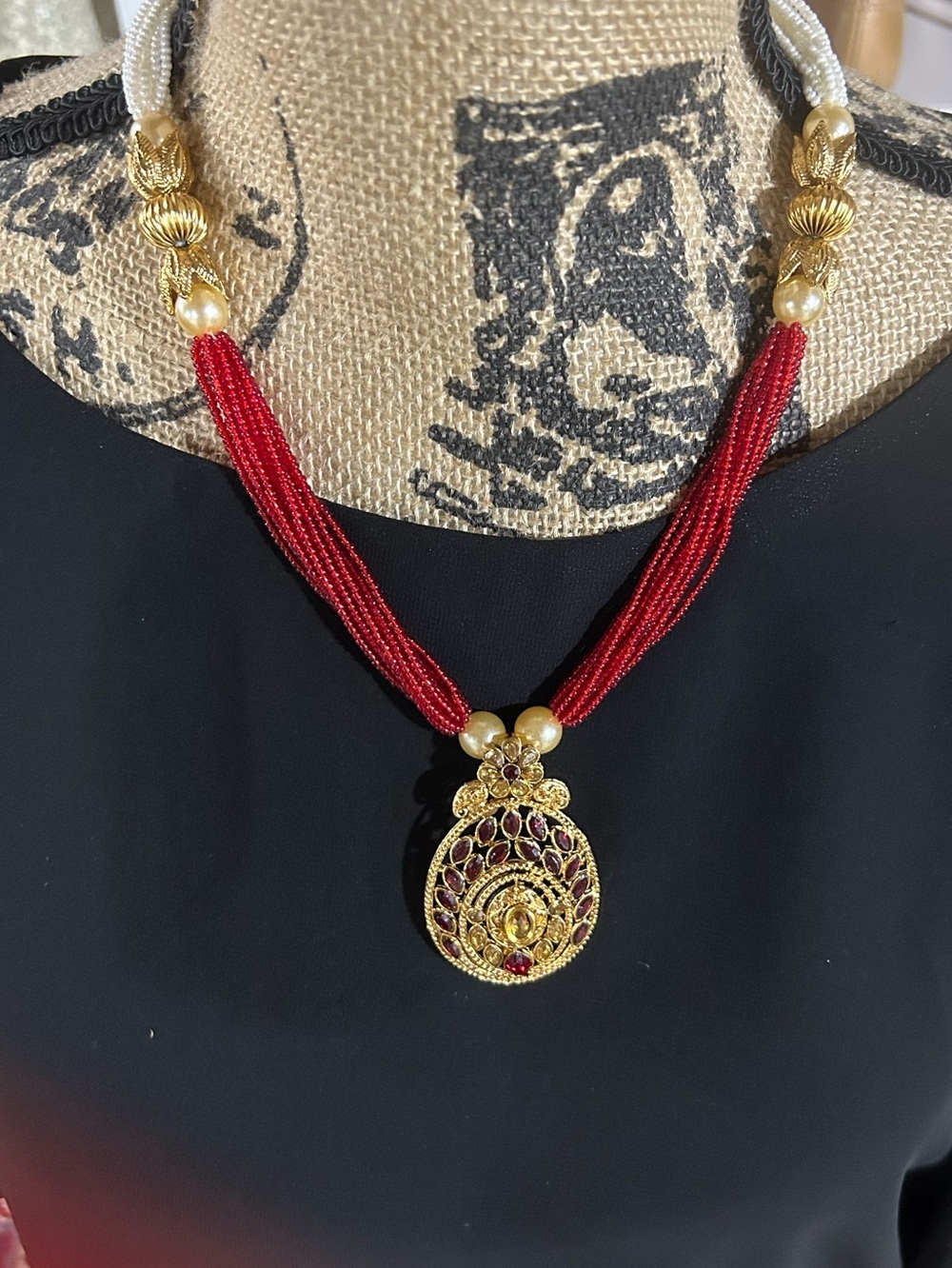 Traditional Red Bead Necklace with Gold Pendant